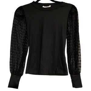 Black top with lace sleeves. Worn once.